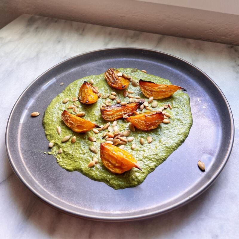 golden beets over pesto with pepitas